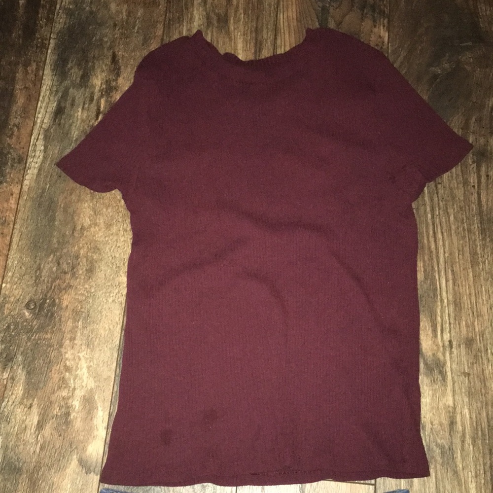 Maroon belly shirt size XL . Jean shorts size 13 , it’s an outfit .